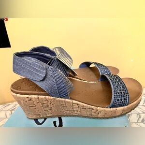 Brand new tags on size women’s 9 sketcher vegan sandals blue color